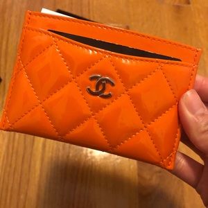 SOLD 100% authentic Chanel orange card holder